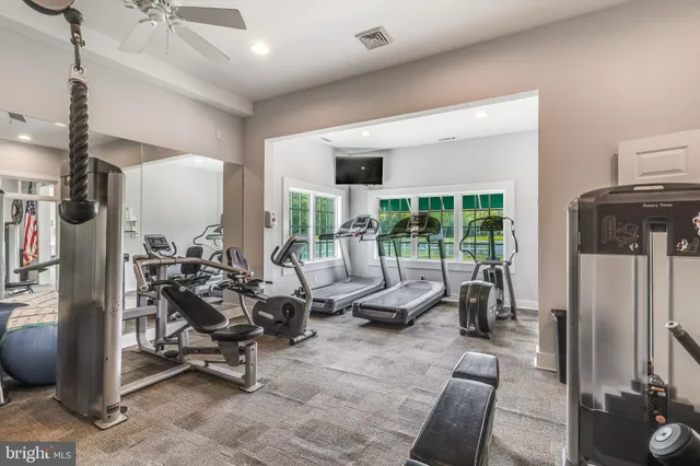 an aerial view of a house with outdoor space swimming pool and outdoor seating