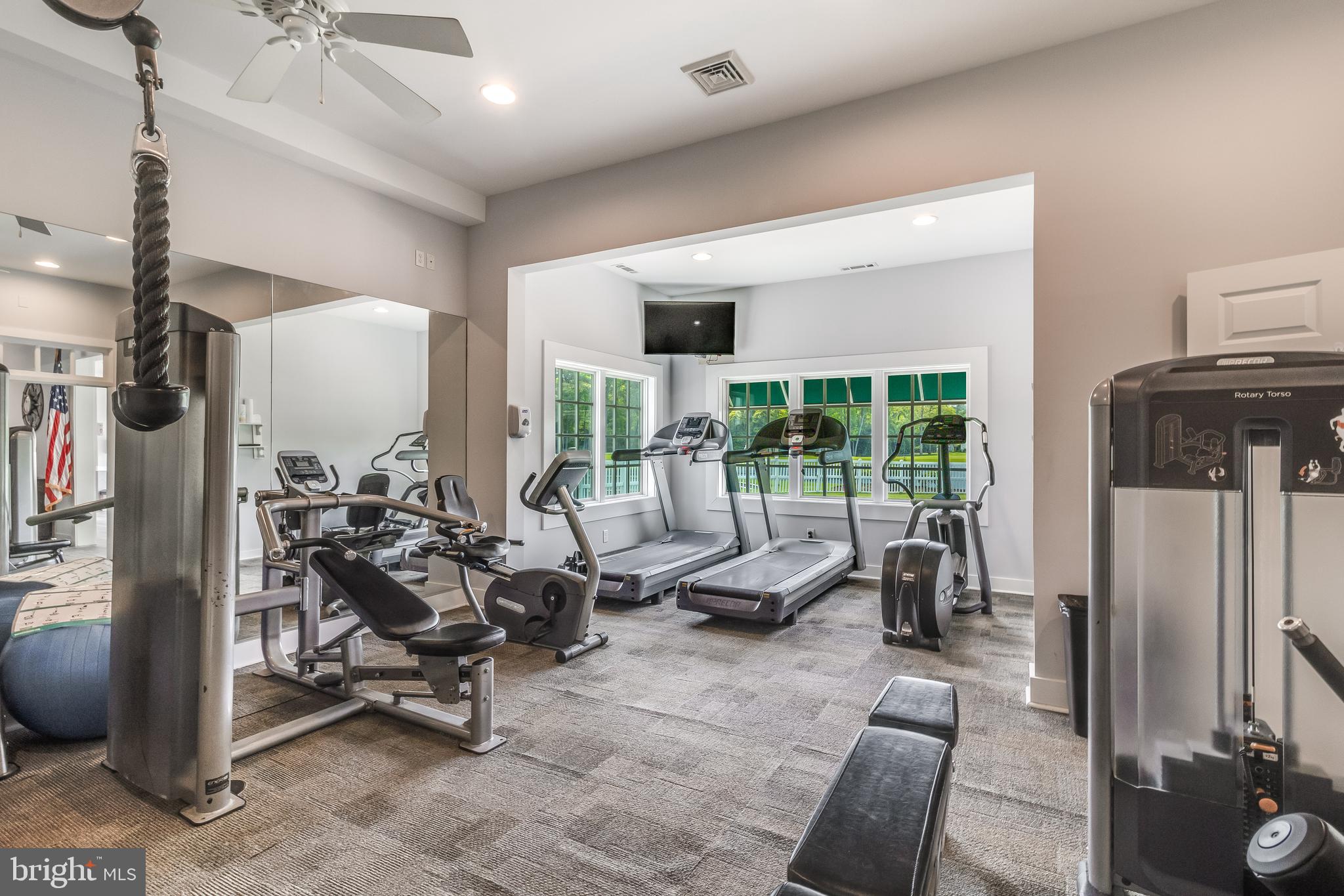32530 Approach Way, Unit 3252 Millsboro, DE 19966 - Photo 43 of 54 a view of a livingroom with couch and a large window