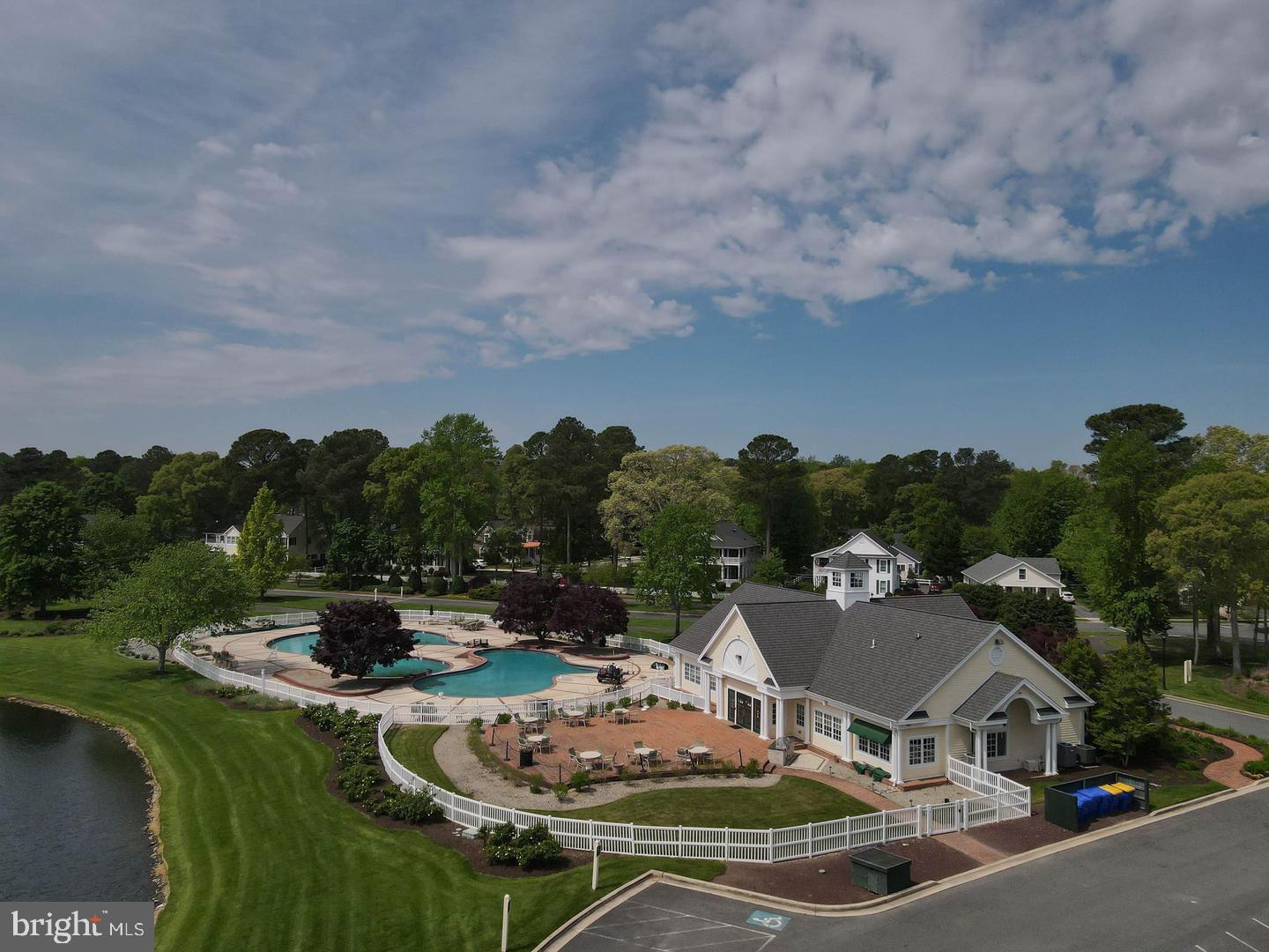 32530 Approach Way, Unit 3252 Millsboro, DE 19966 - Photo 45 of 54 a view of a swimming pool with a patio