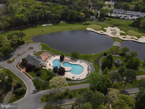 an aerial view of a houses with outdoor space