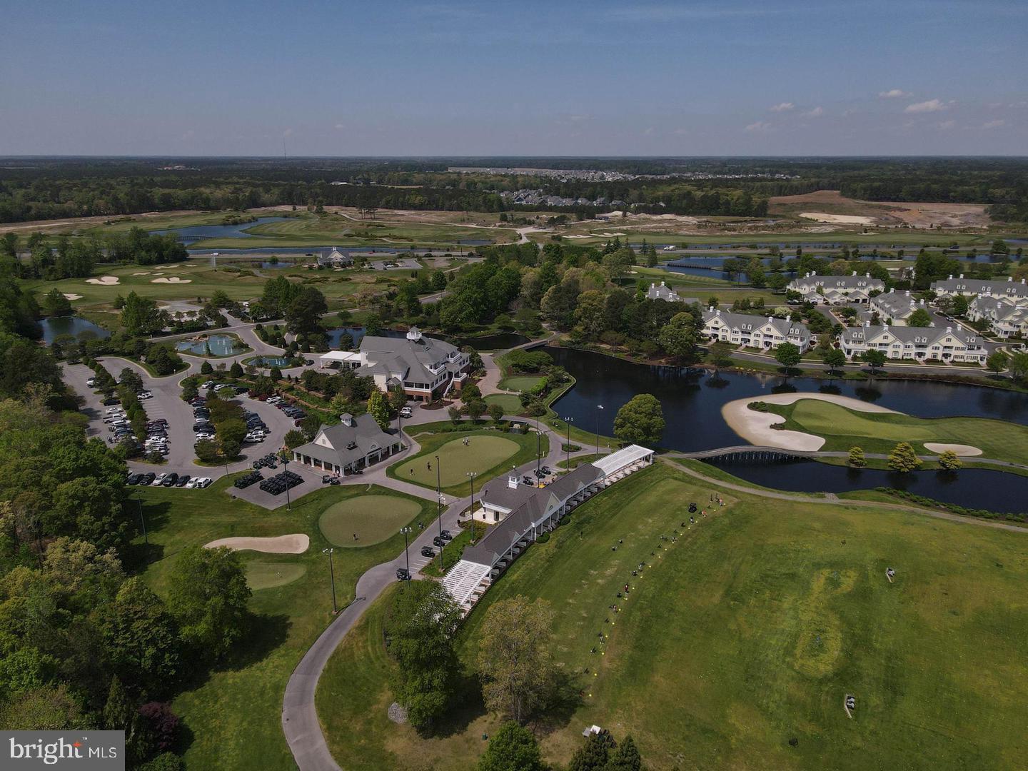 32530 Approach Way, Unit 3252 Millsboro, DE 19966 - Photo 50 of 54 an aerial view of a house with a lake view