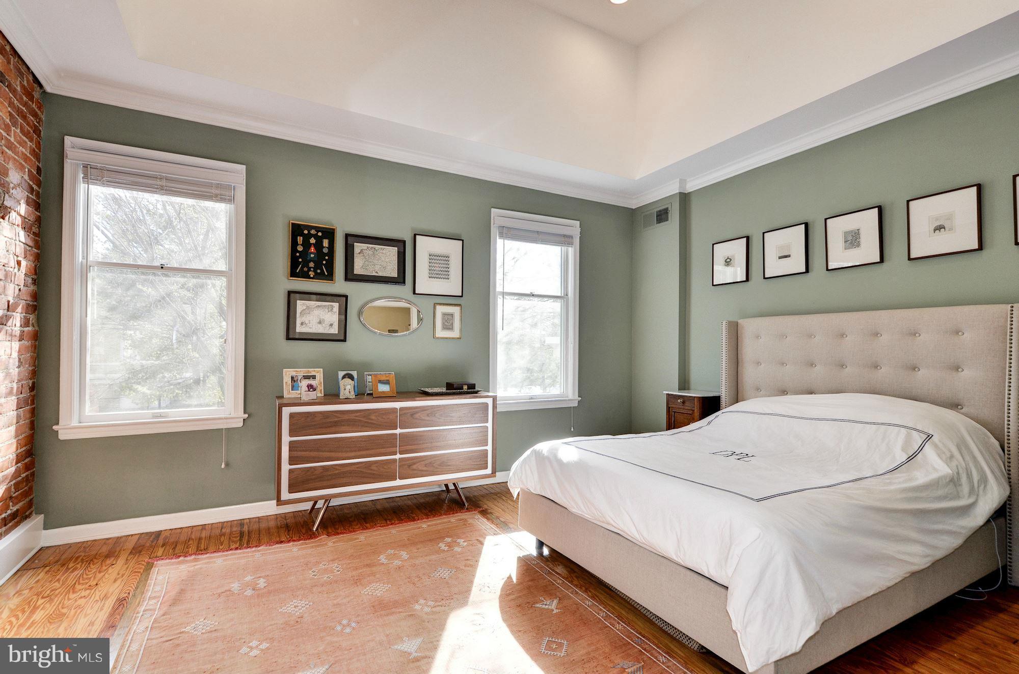 17 15th Street Southeast Washington, DC 20003 - Photo 13 of 28 a bedroom with a bed and a window