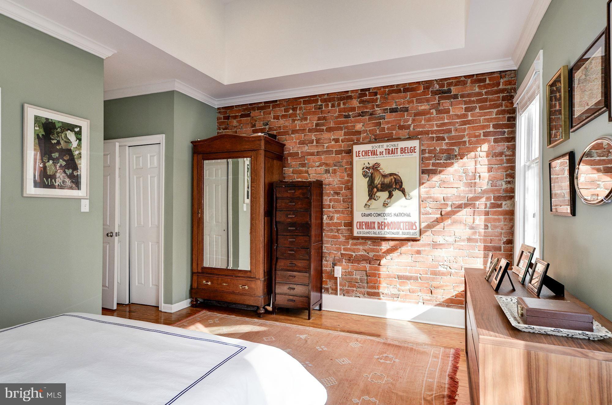 17 15th Street Southeast Washington, DC 20003 - Photo 14 of 28 a bedroom with a bed and a dresser