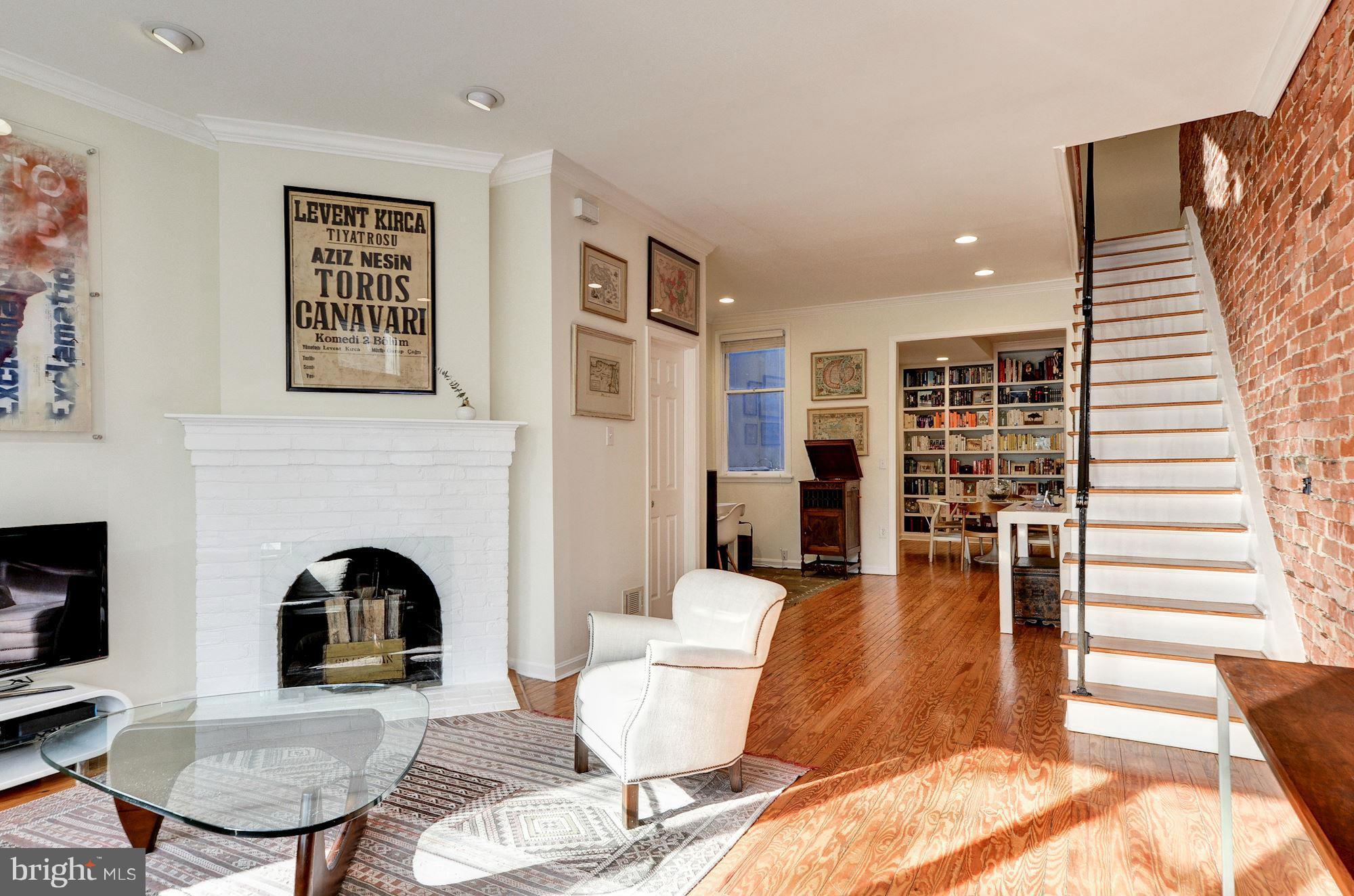 17 15th Street Southeast Washington, DC 20003 - Photo 4 of 28 a living room with furniture and fireplace