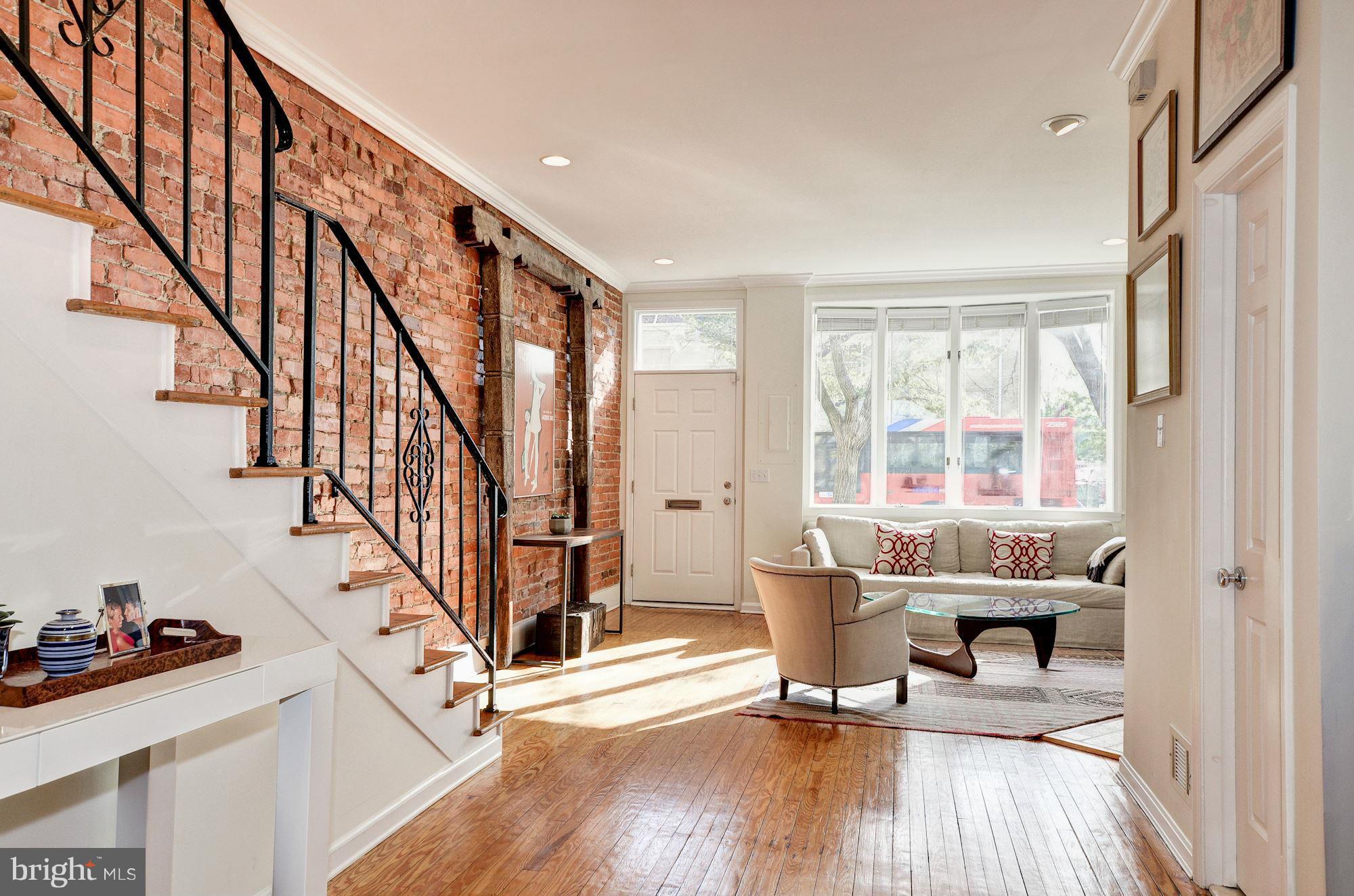17 15th Street Southeast Washington, DC 20003 - Photo 7 of 28 a living room with wooden floor and furniture