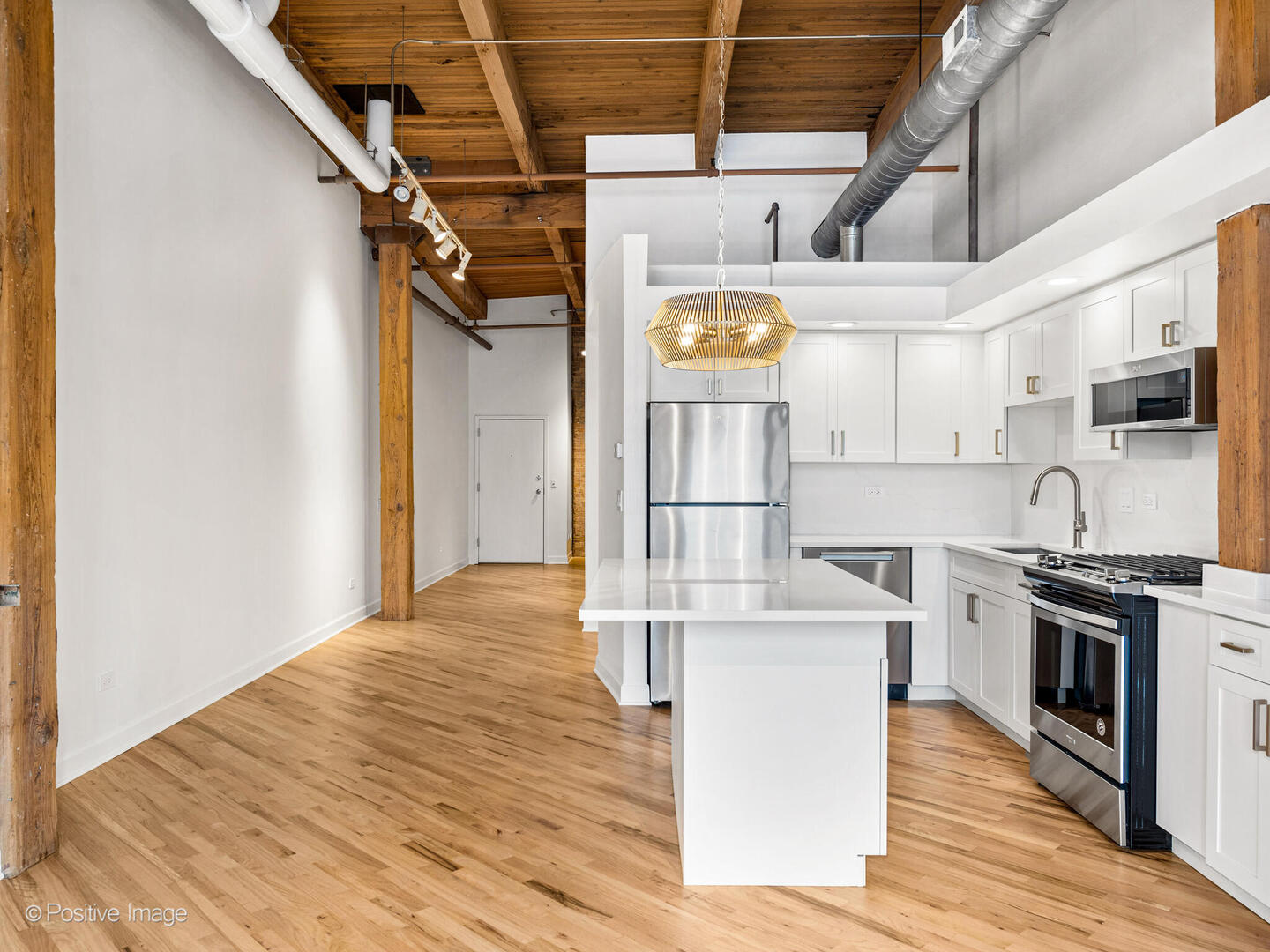 616 West Fulton Street, Unit 614 Chicago, IL 60661 - Photo 15 of 27 a view of a kitchen with stainless steel appliances granite countertop a stove and a refrigerator