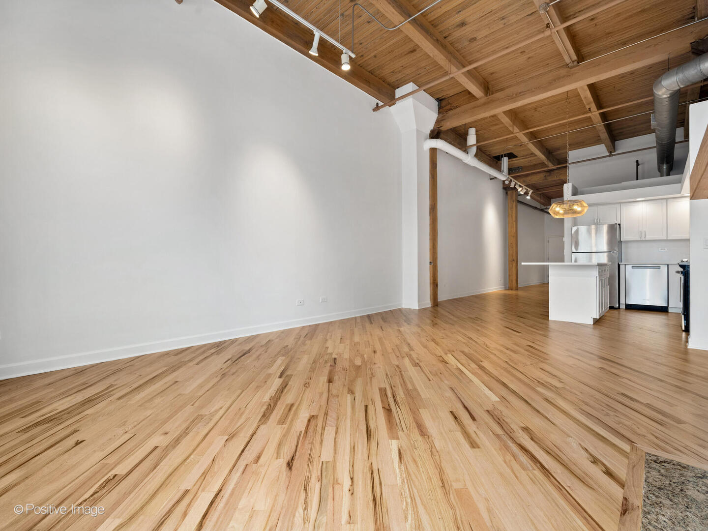 616 West Fulton Street, Unit 614 Chicago, IL 60661 - Photo 18 of 27 a view of empty room with wooden floor