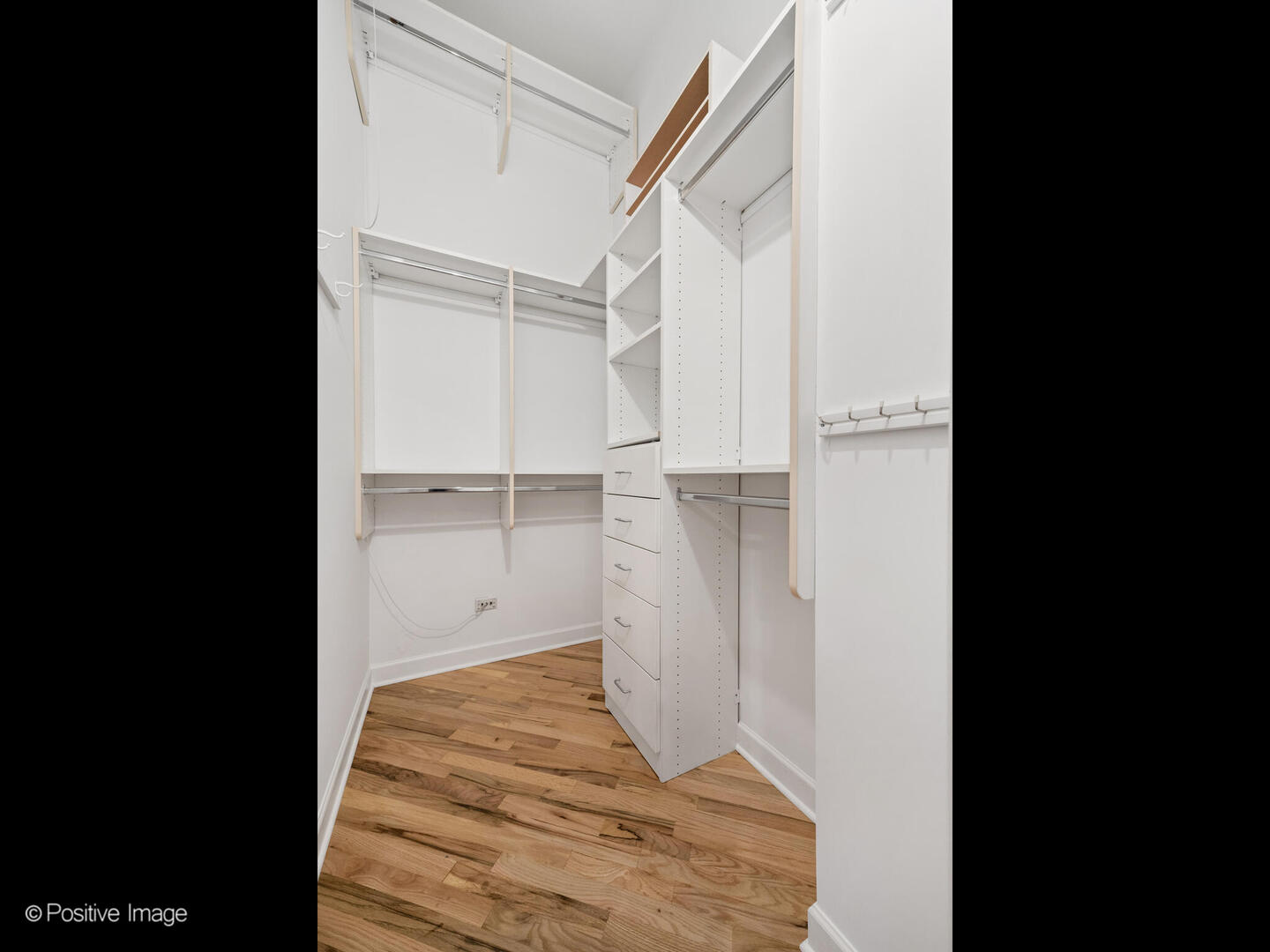 616 West Fulton Street, Unit 614 Chicago, IL 60661 - Photo 10 of 27 a view of walk in closet with empty racks