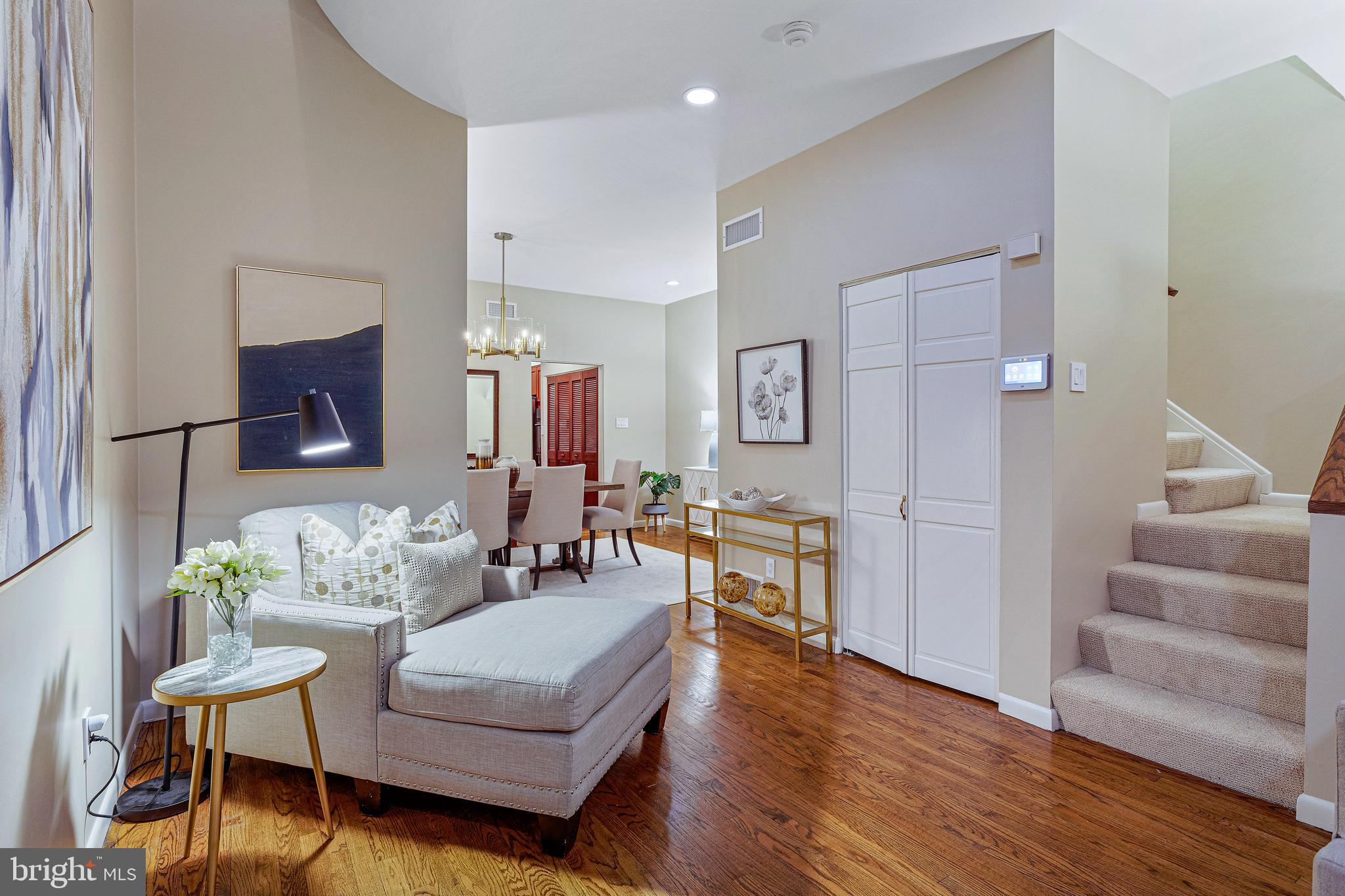 144 Tennessee Avenue Northeast Washington, DC 20002 - Photo 12 of 68 a living room with furniture and a wooden floor