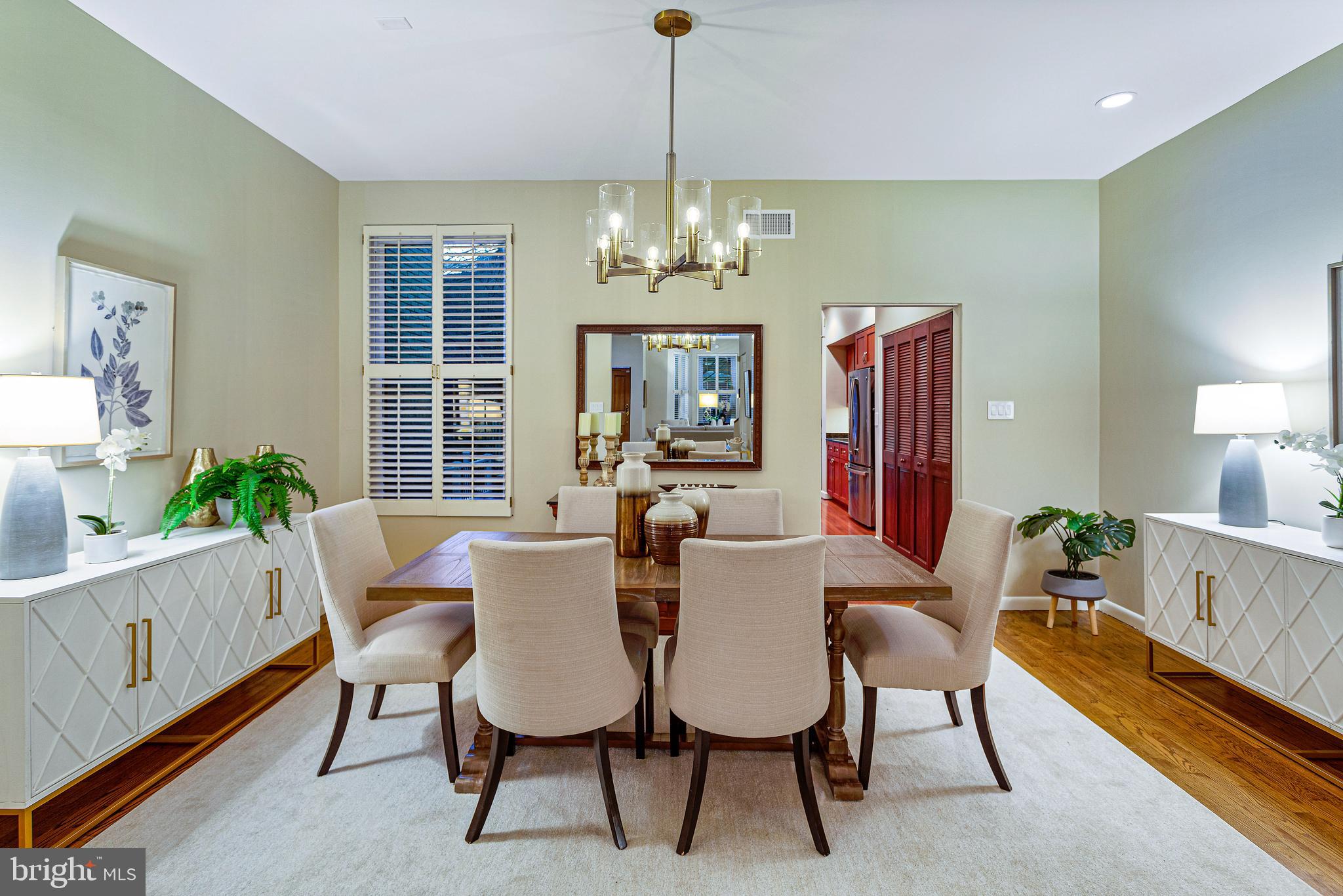 144 Tennessee Avenue Northeast Washington, DC 20002 - Photo 16 of 68 a view of a dining room with furniture a chandelier and wooden floor