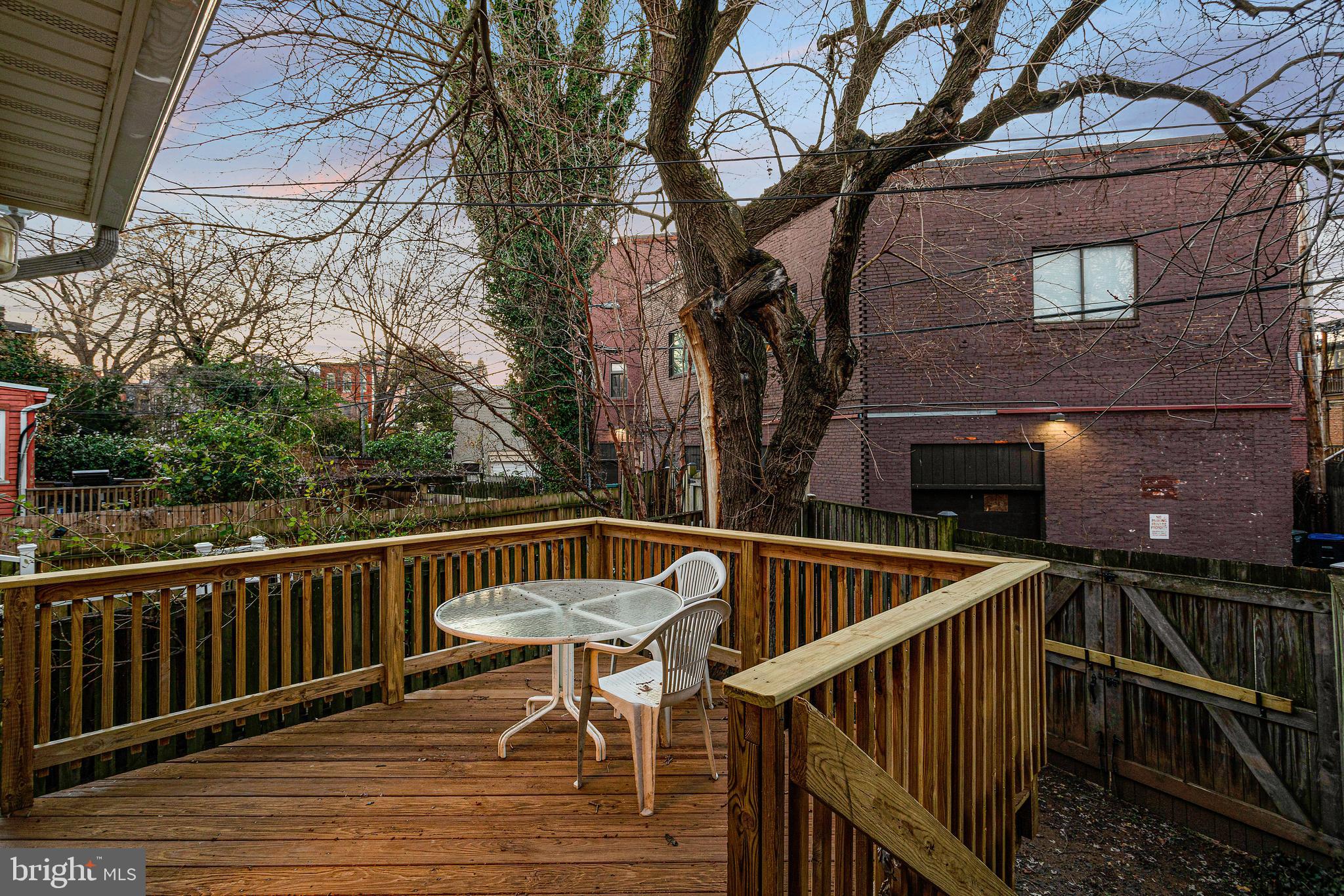 144 Tennessee Avenue Northeast Washington, DC 20002 - Photo 29 of 68 a view of balcony with wooden floor and outdoor seating