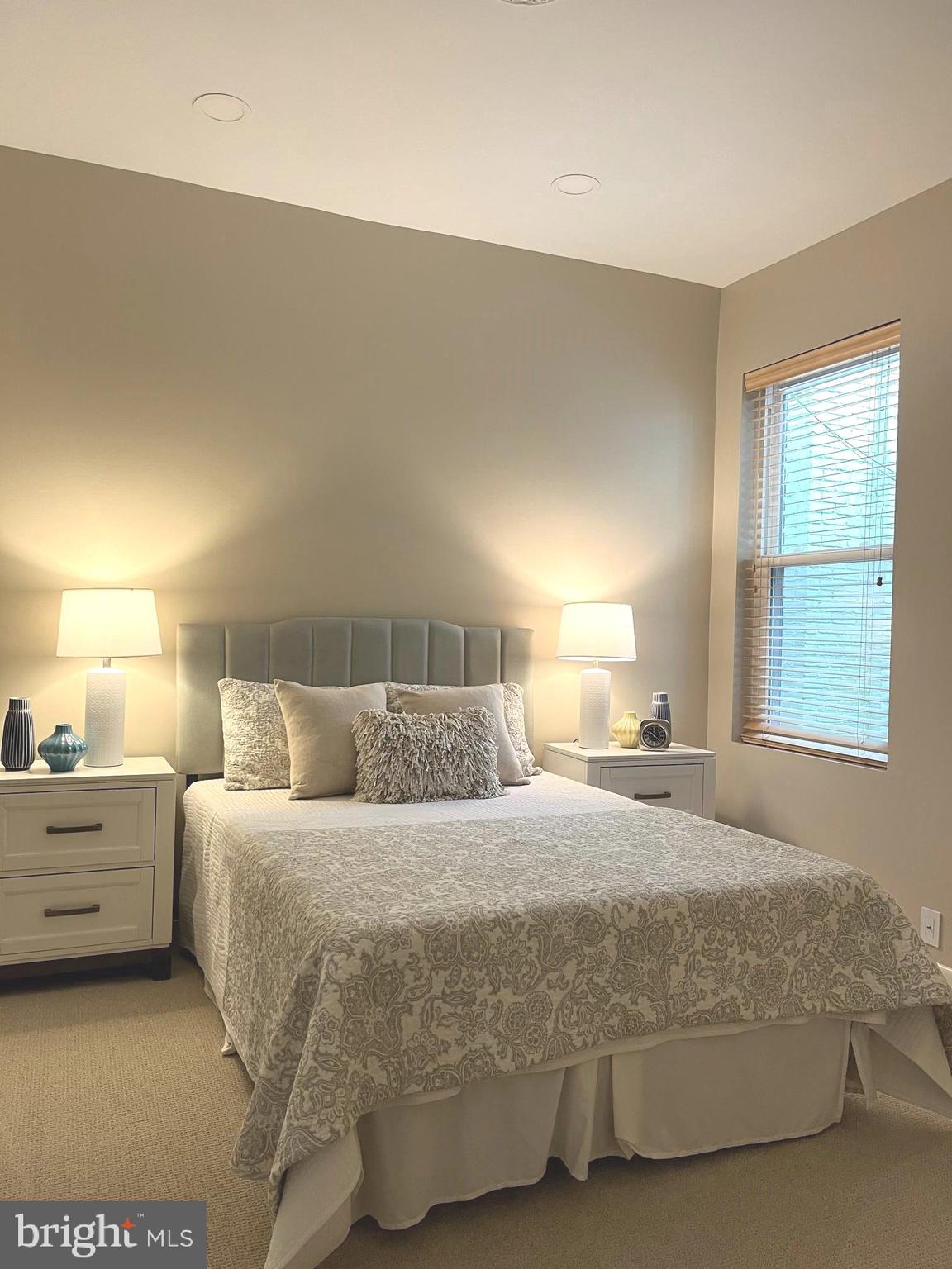 144 Tennessee Avenue Northeast Washington, DC 20002 - Photo 45 of 68 a bedroom with a bed and a window