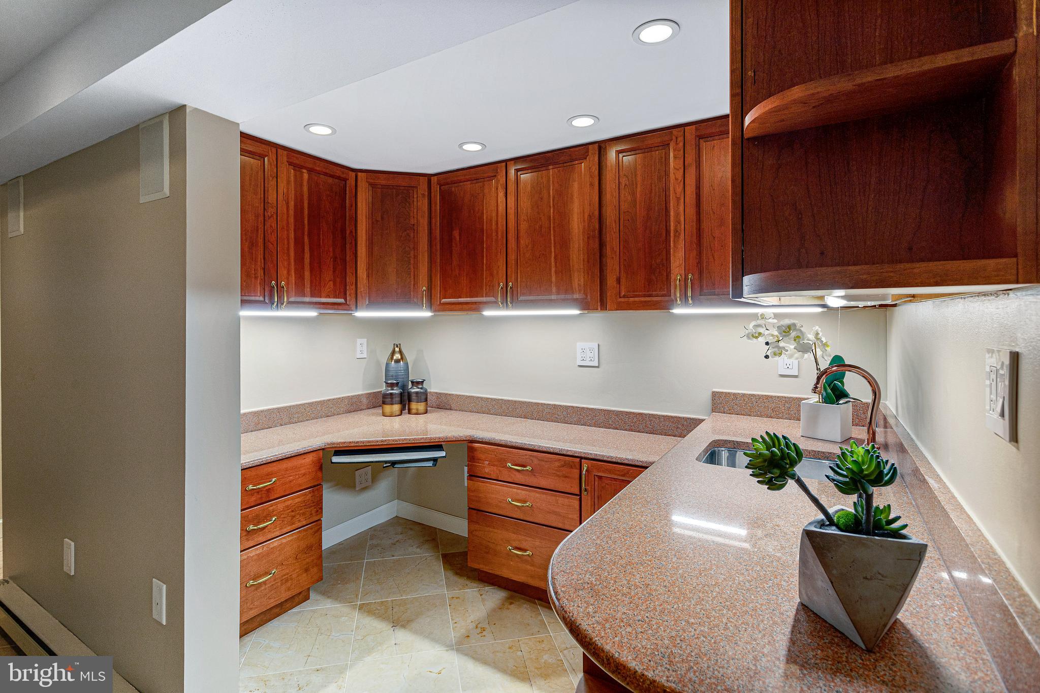 144 Tennessee Avenue Northeast Washington, DC 20002 - Photo 58 of 68 a kitchen with stainless steel appliances granite countertop a sink a stove and a microwave