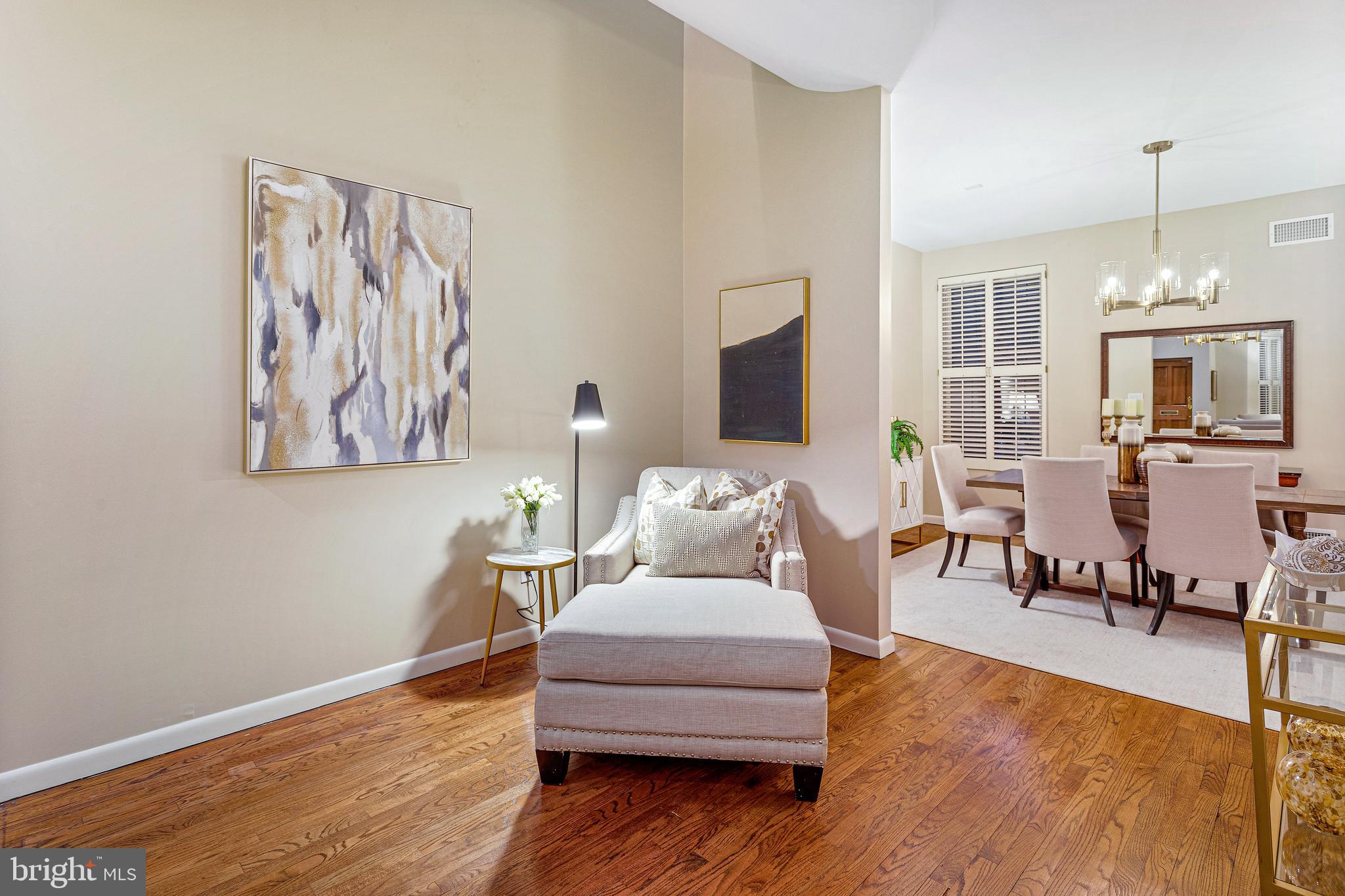 144 Tennessee Avenue Northeast Washington, DC 20002 - Photo 10 of 68 a living room with furniture and a wooden floor