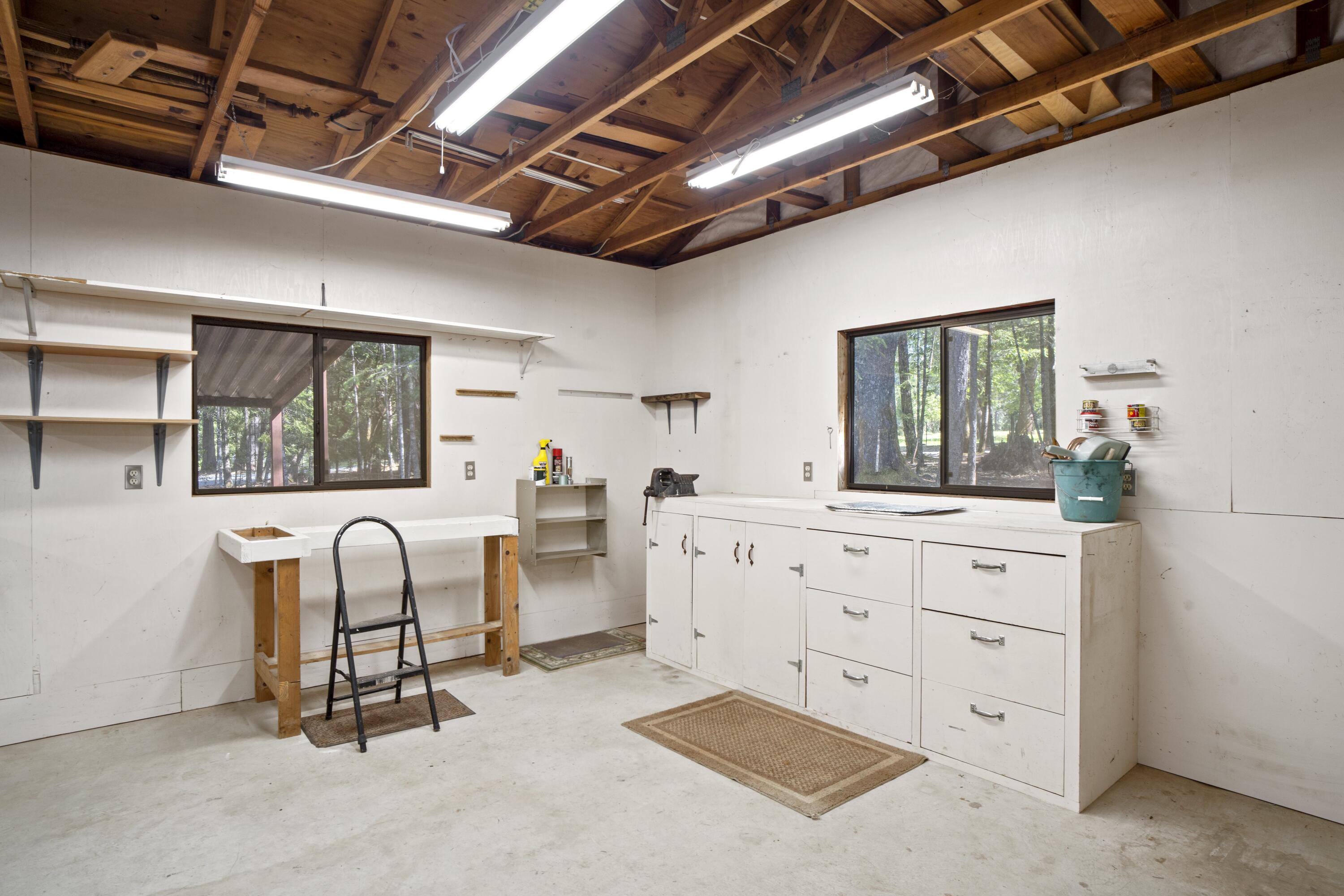 2021 Queens Branch Road Rogue River, OR 97537 - Photo 27 of 37 a view of a large white kitchen with a large window