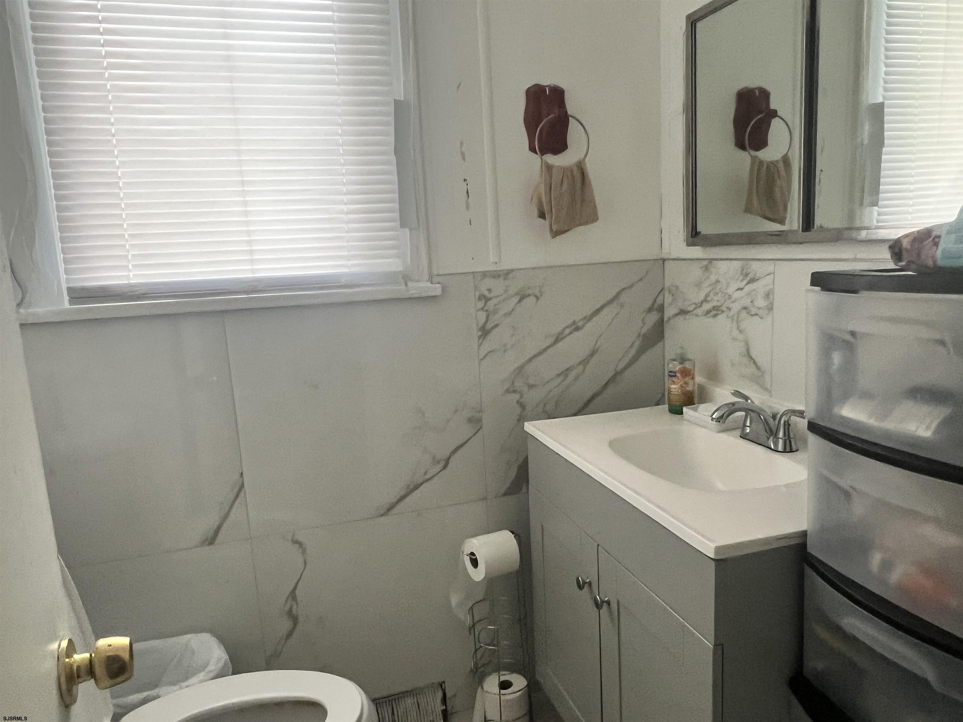 2 9th Street Salem, NJ 08079 - Photo 16 of 33 a bathroom with a sink and a toilet