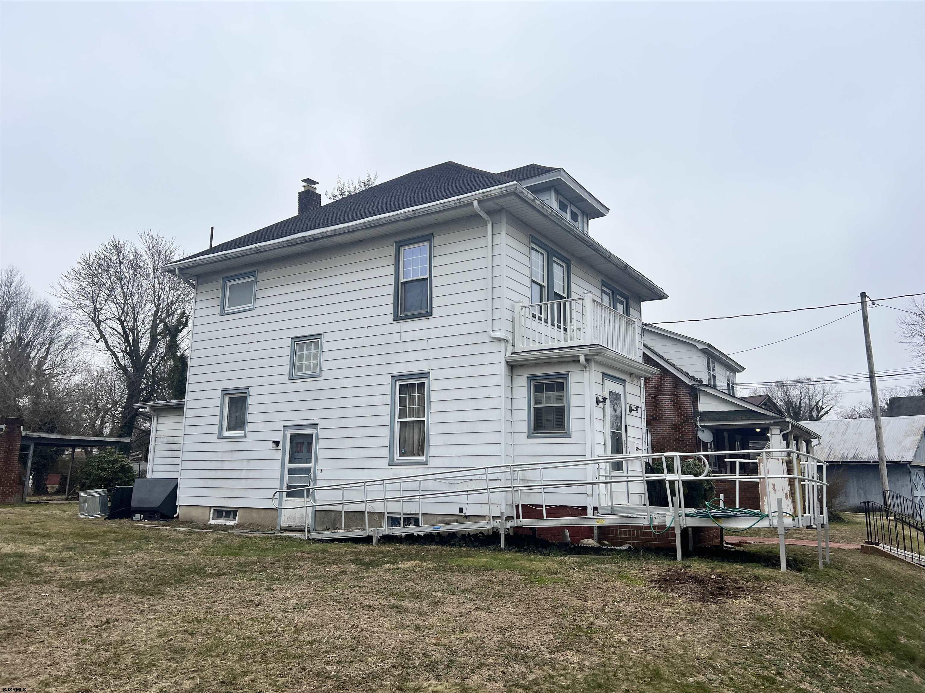 2 9th Street Salem, NJ 08079 - Photo 2 of 33 a view of a house with a backyard