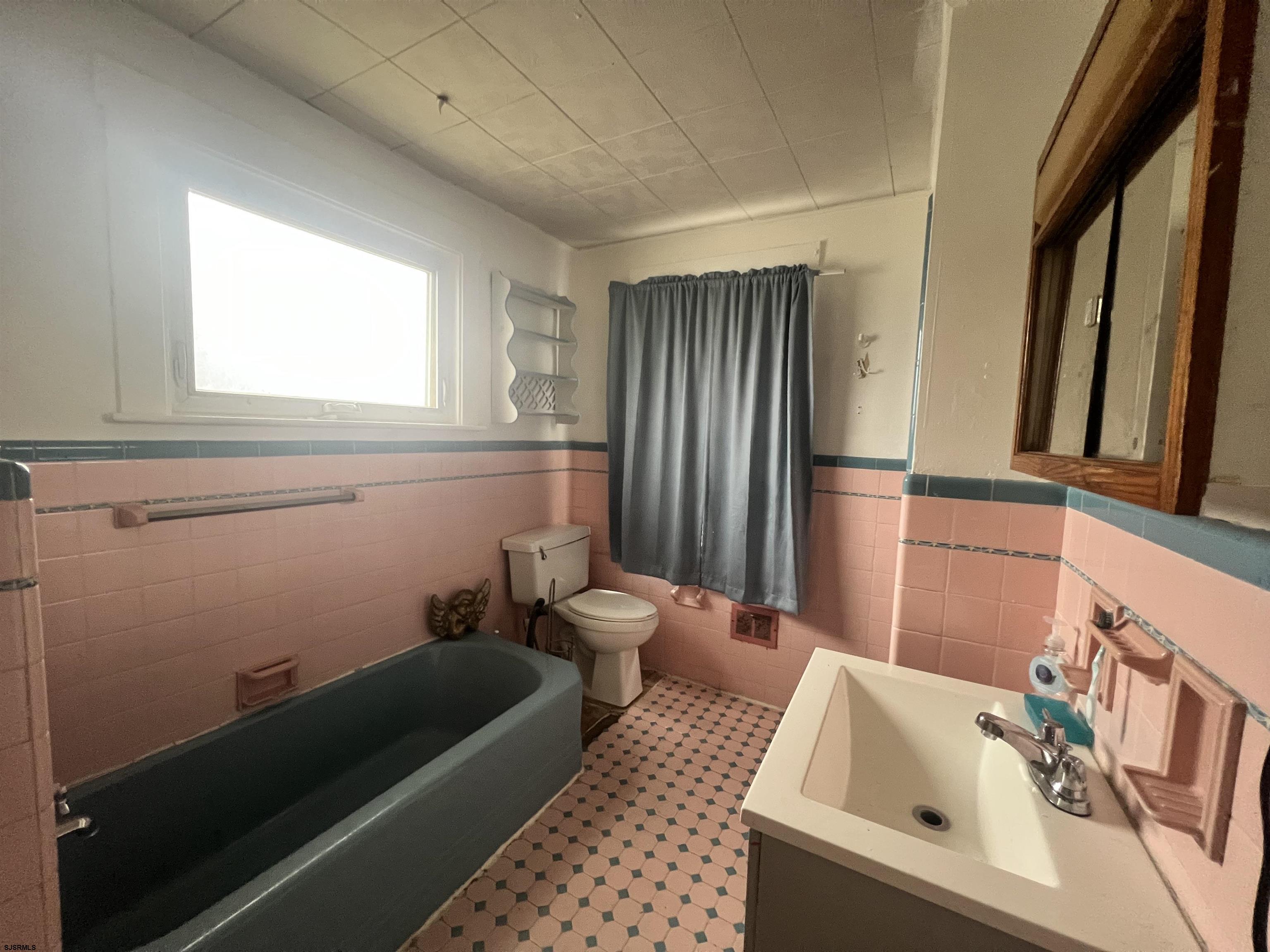 2 9th Street Salem, NJ 08079 - Photo 24 of 33 a bathroom with a sink and a bathtub