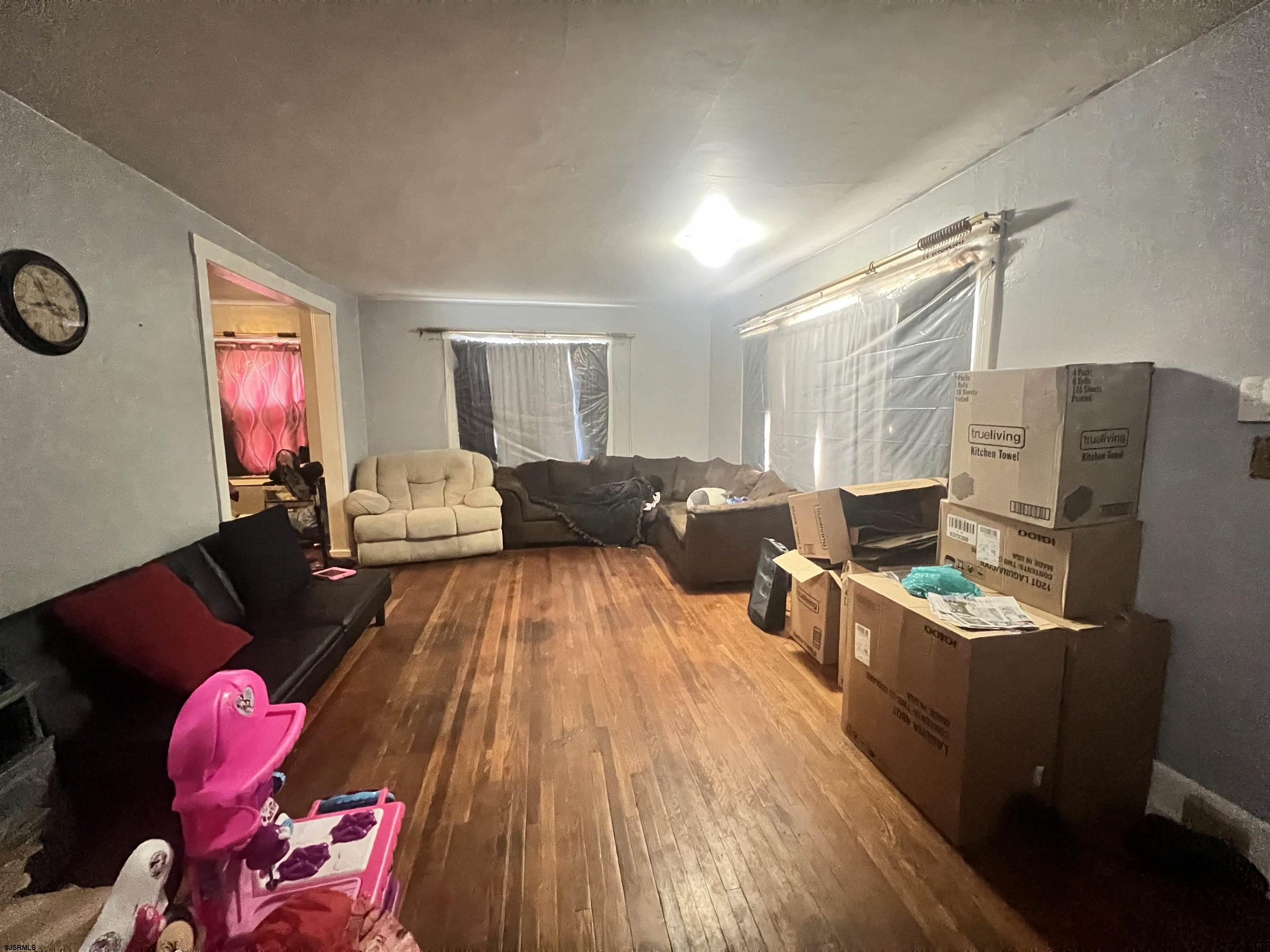 2 9th Street Salem, NJ 08079 - Photo 10 of 33 a living room with furniture and a flat screen tv