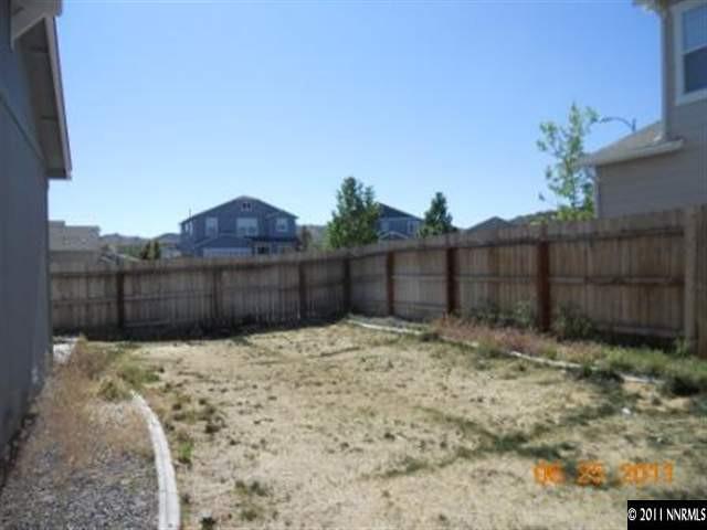 7732 Corso Street Reno, NV 89506 - Photo 11 of 13 a view of wooden fence
