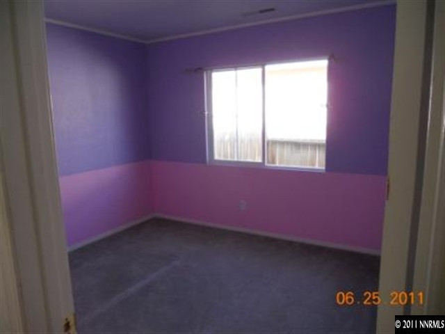 7732 Corso Street Reno, NV 89506 - Photo 8 of 13 an empty room with a window