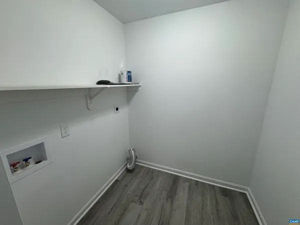 a view of a room with racks on the wall