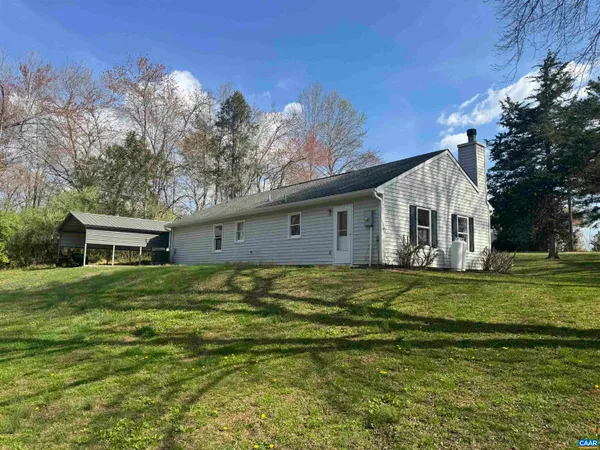 a house view with a backyard space