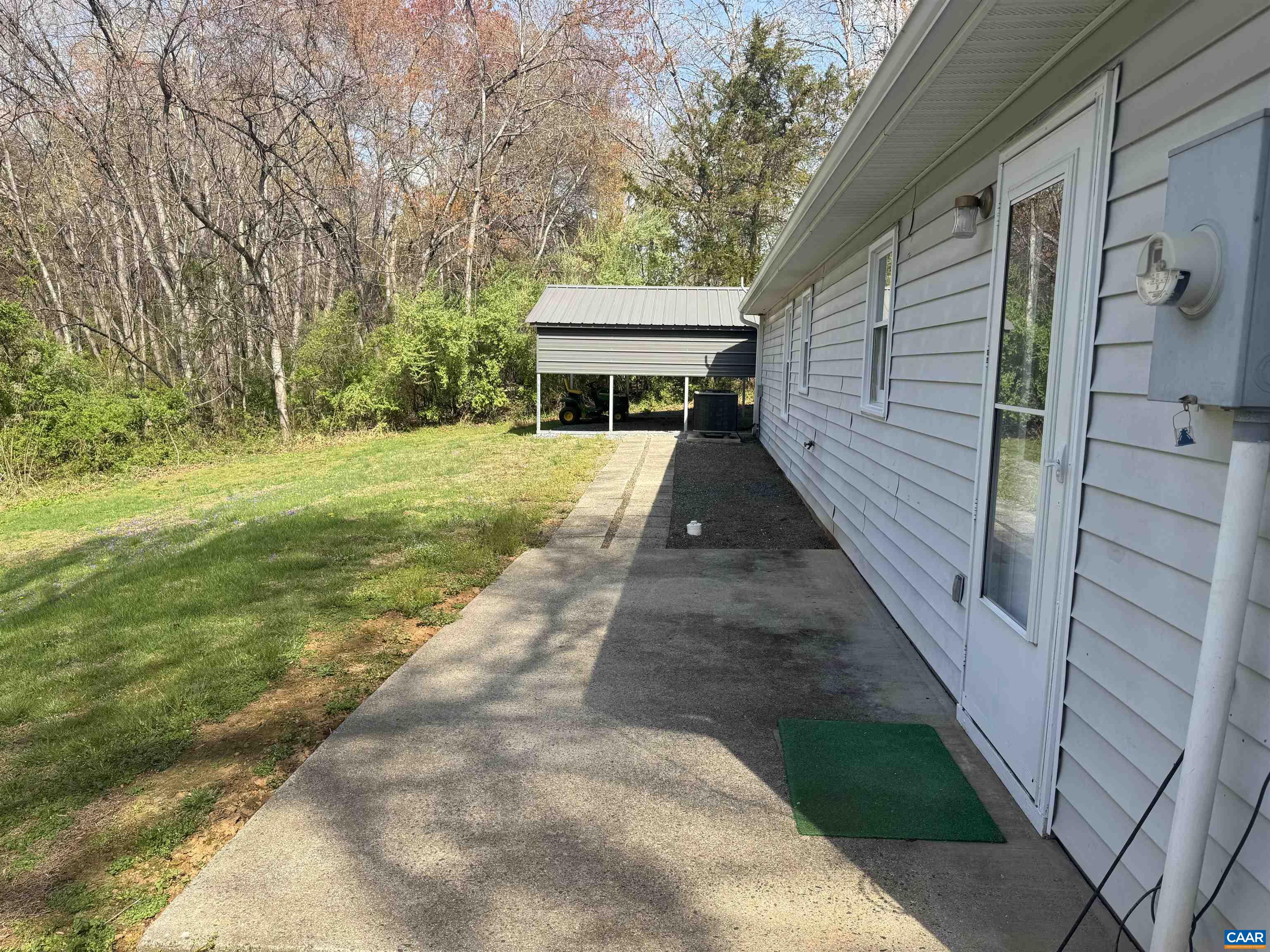 109 Narcissus Road Ruckersville, VA 22968 - Photo 6 of 27 a view of a house with a backyard