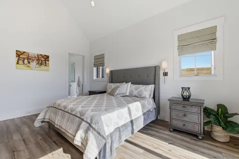 a view of a living room and a floor to ceiling window