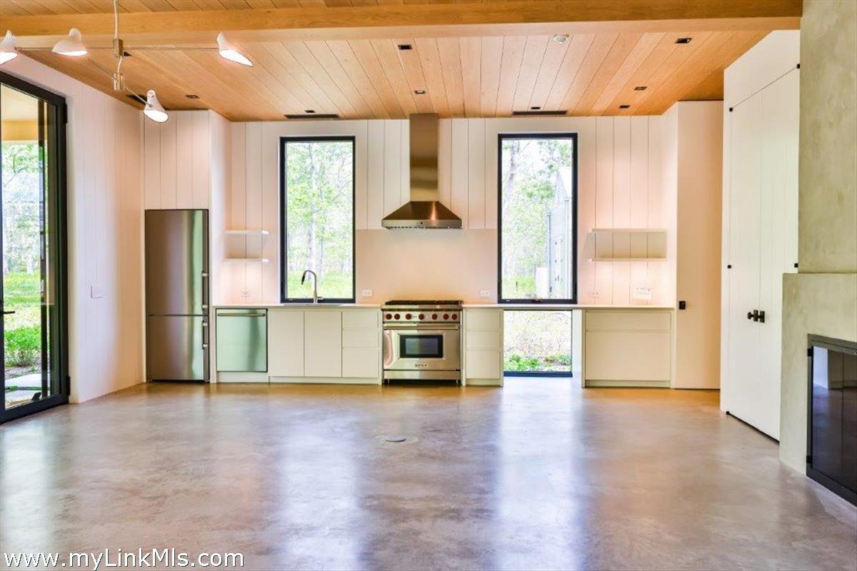 4 Jacob's Neck Road Edgartown, MA 02539 - Photo 11 of 20 a view of a refrigerator in kitchen and wooden floor