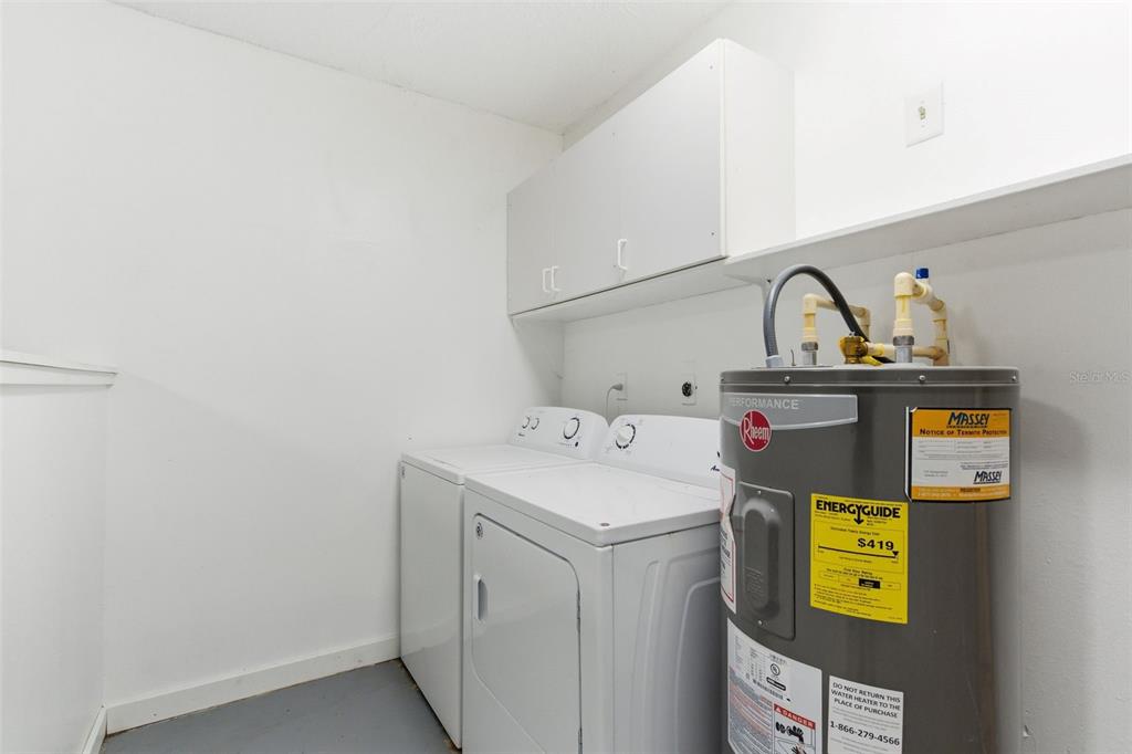 2227 Montclair Drive Sarasota, FL 34231 - Photo 20 of 48 a utility room with dryer and washer