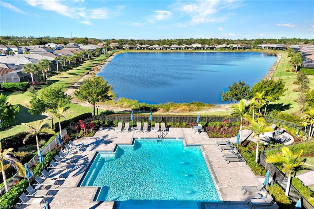 2171 Yellowfin Circle Naples, FL 34114 - Photo 34 of 38 an aerial view of residential houses with outdoor space and river