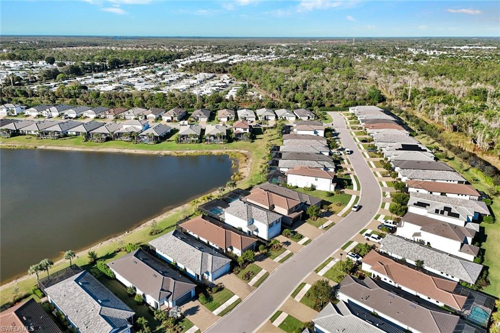 2171 Yellowfin Circle Naples, FL 34114 - Photo 37 of 38 an aerial view of a city with ocean view