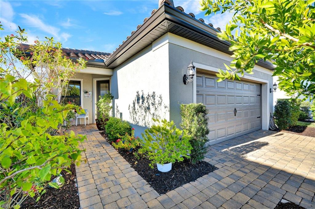2171 Yellowfin Circle Naples, FL 34114 - Photo 5 of 38 a view of a back yard of the house