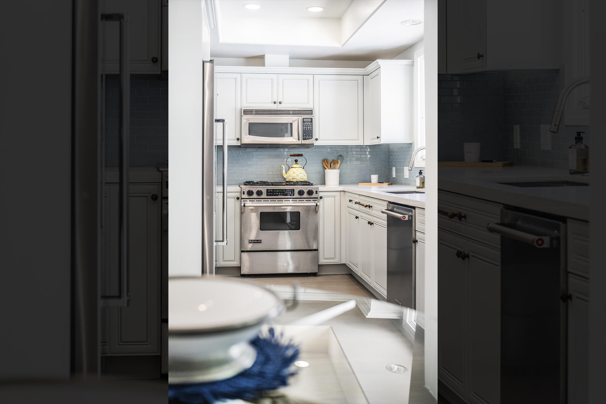 1647 Posilipo Lane, Unit B Montecito, CA 93108 - Photo 12 of 37 a kitchen with stainless steel appliances a stove a sink and a refrigerator