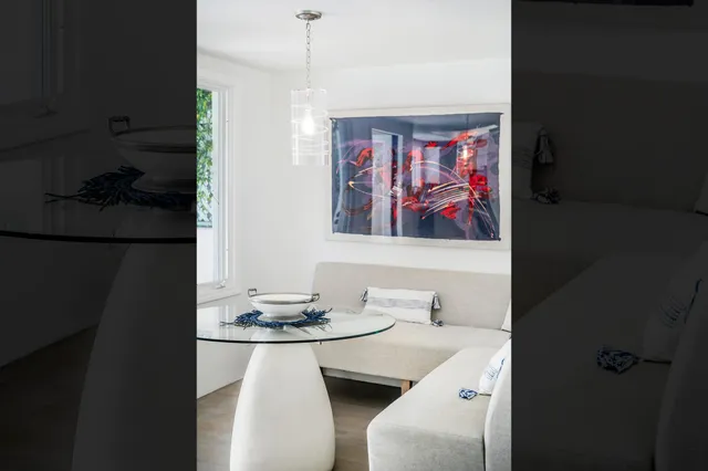 a view of a dining room with furniture