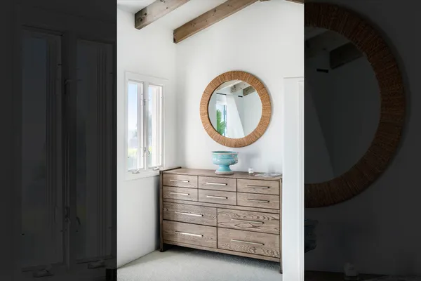 a bathroom with a granite countertop sink mirror and double