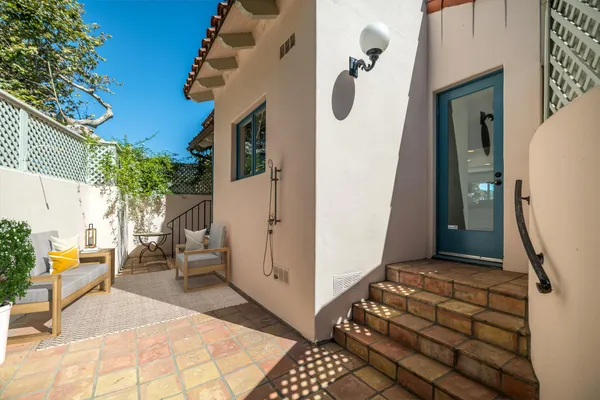 a balcony view with a garden space