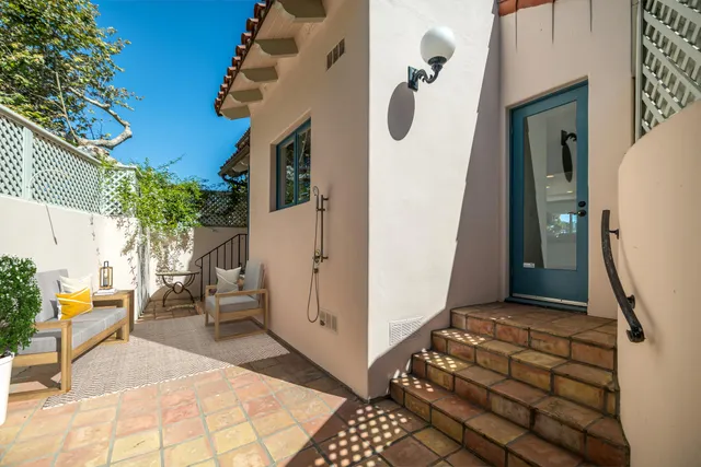 a balcony view with a garden space