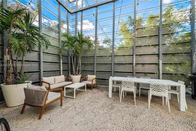 a couple of chairs sitting in front of a building