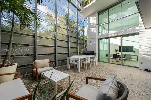 a view of a livingroom with furniture and outdoor view