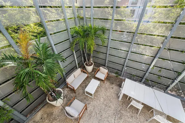 a view of a backyard with plants