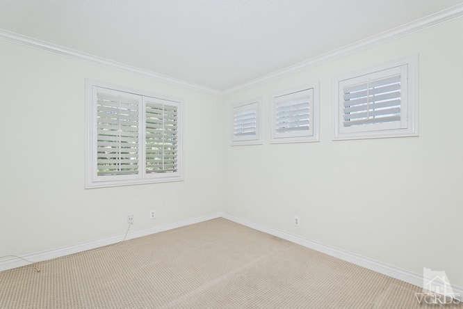 1159 Corto Street Simi Valley, CA 93065 - Photo 14 of 26 an empty room with windows