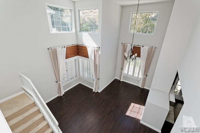 1159 Corto Street Simi Valley, CA 93065 - Photo 10 of 26 a view of an entryway with wooden floor and windows
