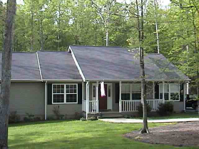 a house view with a garden space