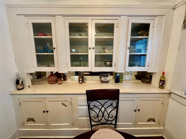 a bathroom with a sink toilet and mirror