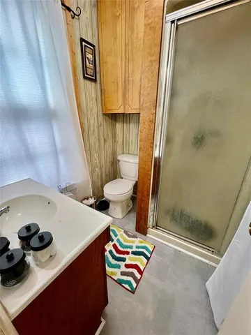 a bathroom with a sink and toilet