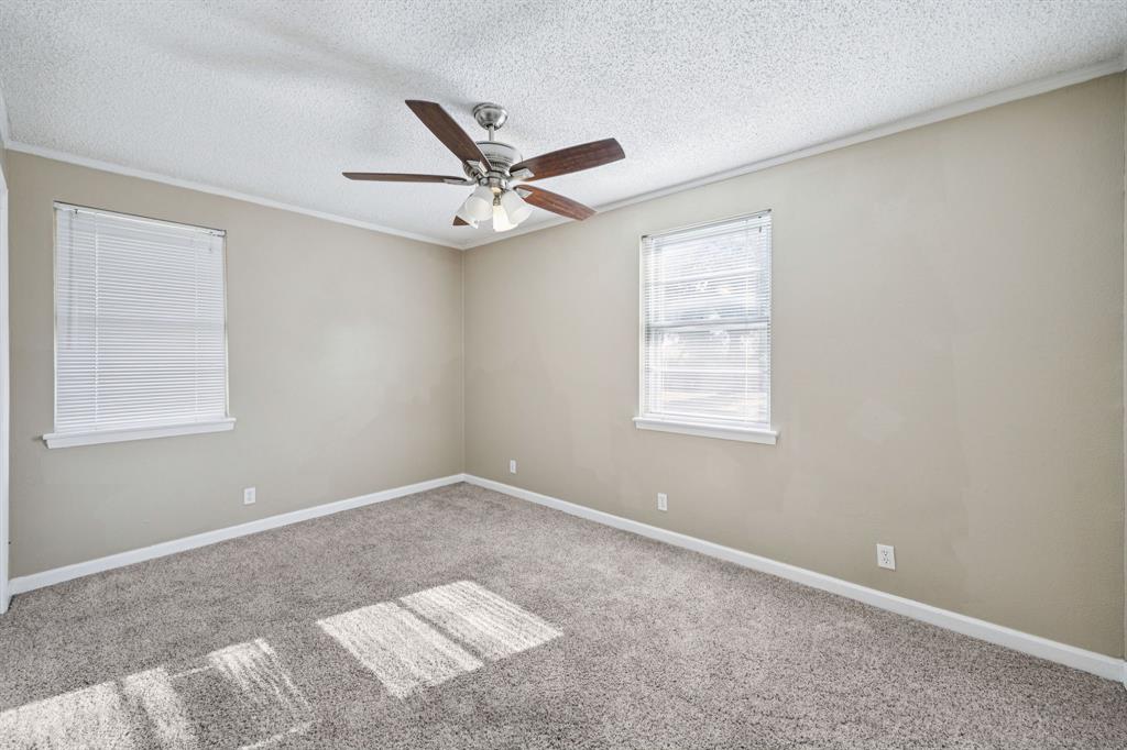 2017 Durham Street Irving, TX 75062 - Photo 17 of 26 a view of an empty room with a window