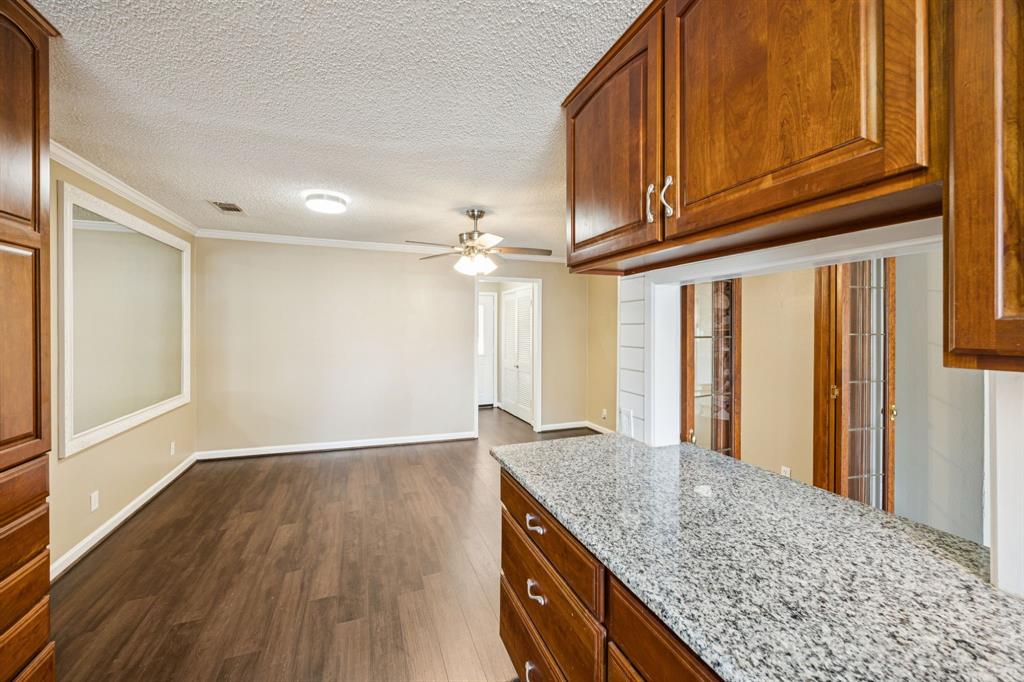 2017 Durham Street Irving, TX 75062 - Photo 22 of 26 a view of kitchen and wooden floor