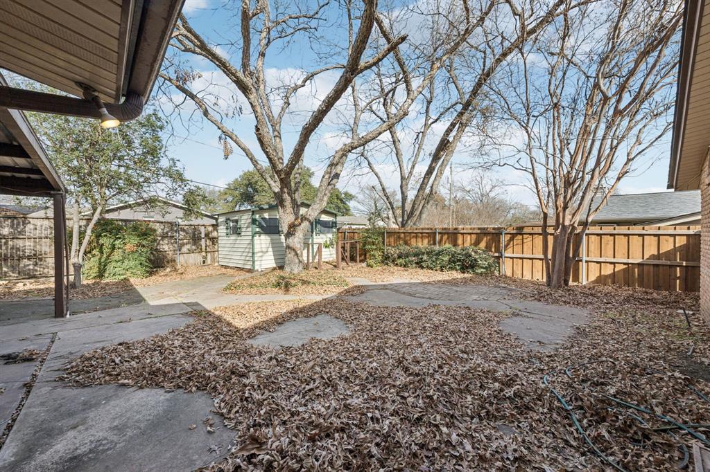 2017 Durham Street Irving, TX 75062 - Photo 24 of 26 a view of road with large trees